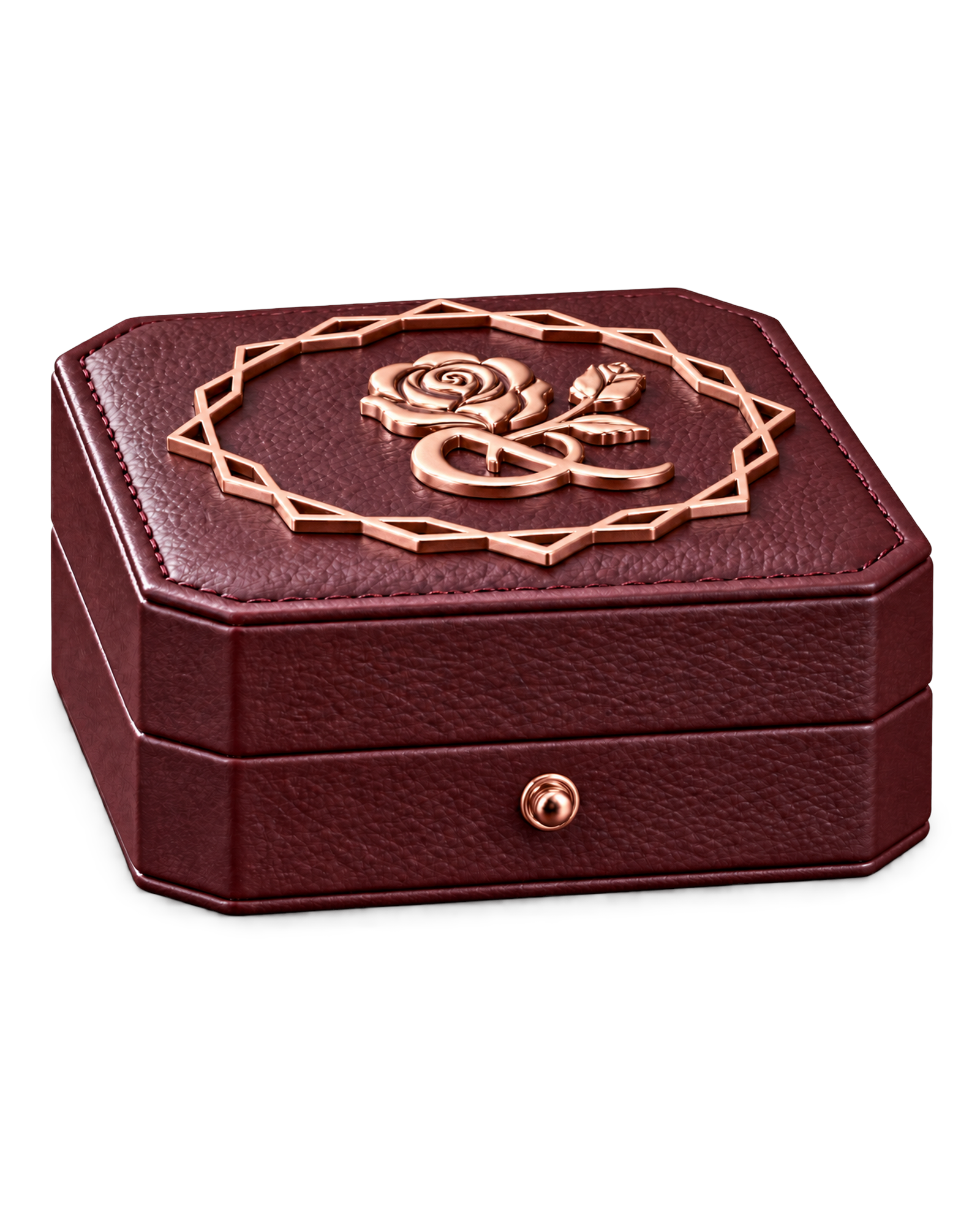 The house box — the rose and ampersand emblem in rose gold on claret leather.